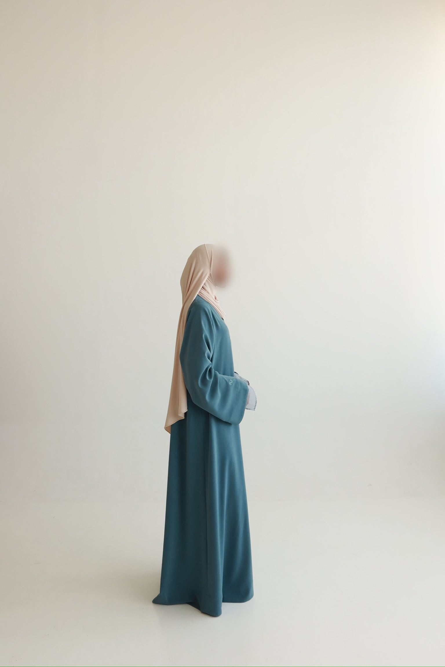 Elara – Petrol Mist